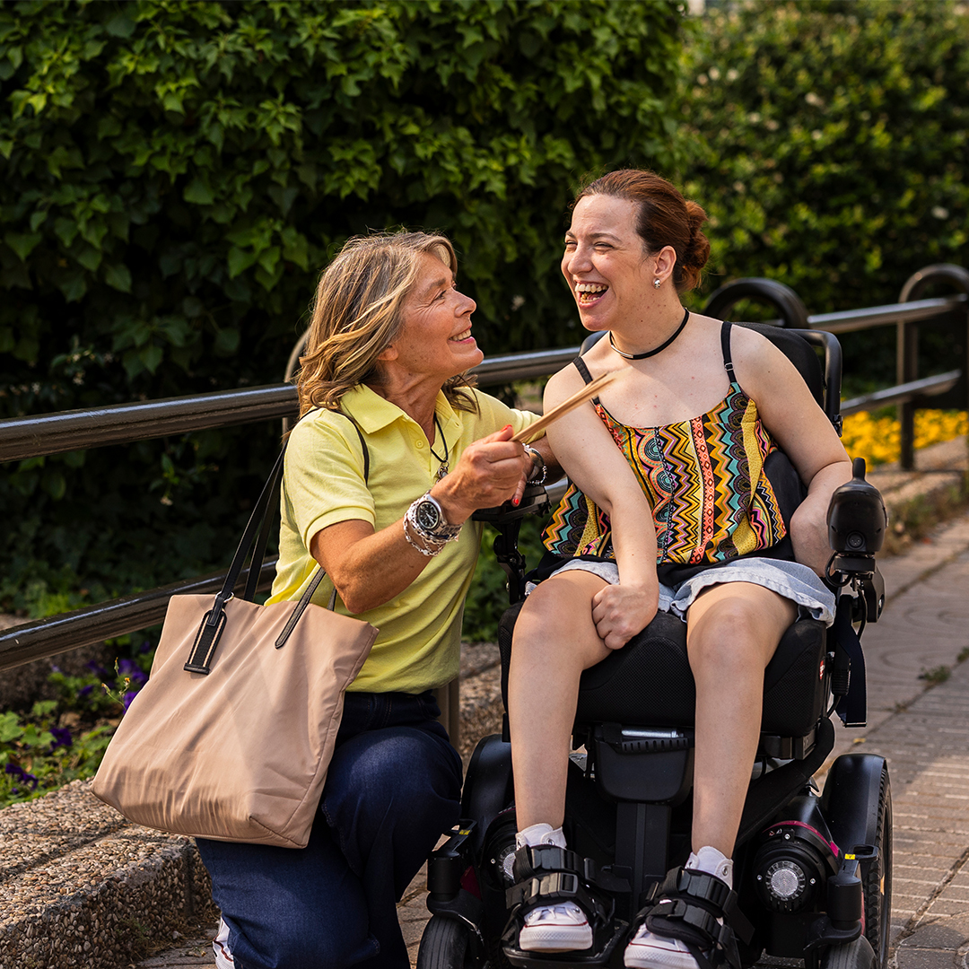 Lighthouse client and support worker sharing a moment together